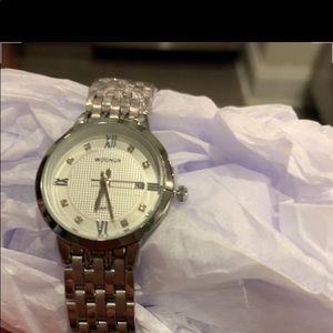 Ladies Woonun silver watch